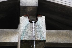 How to Prevent Roof Water Runoff from Pooling